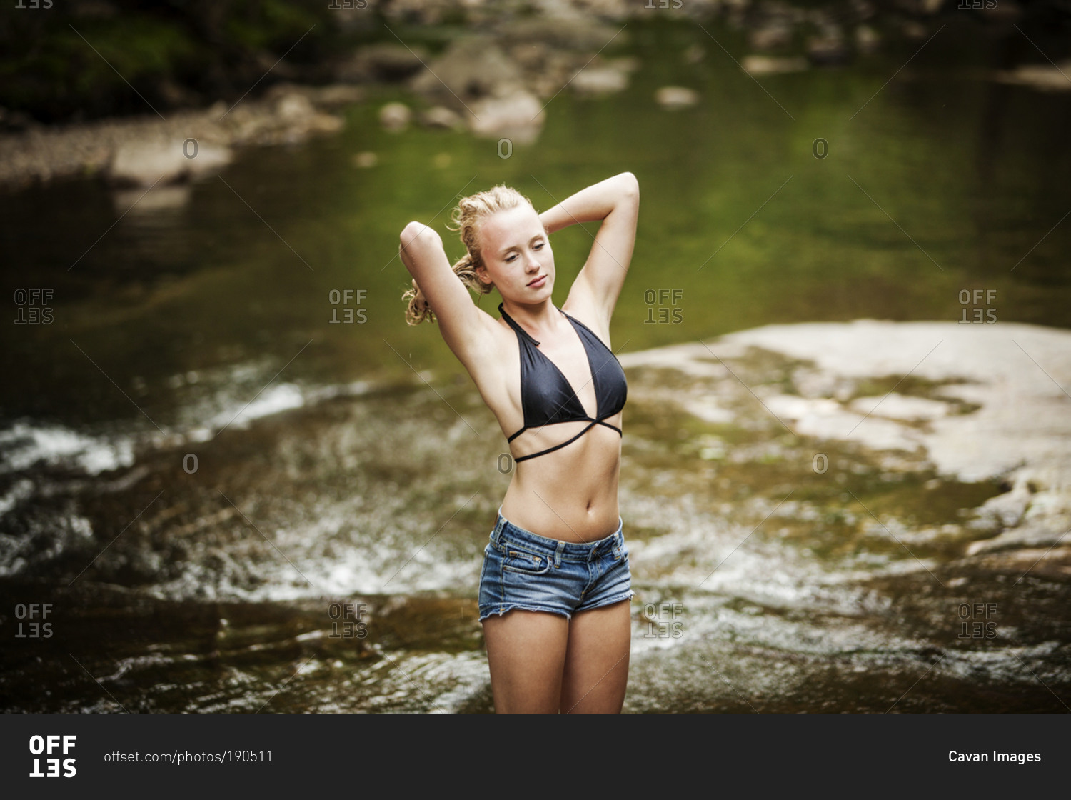 Woman In Bikini Stretching Stock Photo, Picture and Royalty Free