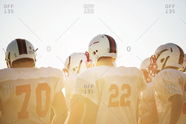 High school football players in the sunlight