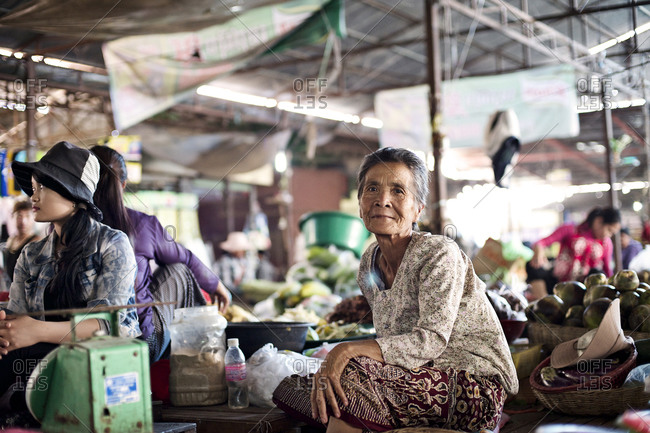 Siem Reap, Cambodia - December 21, 2014: Elderly woman at a market