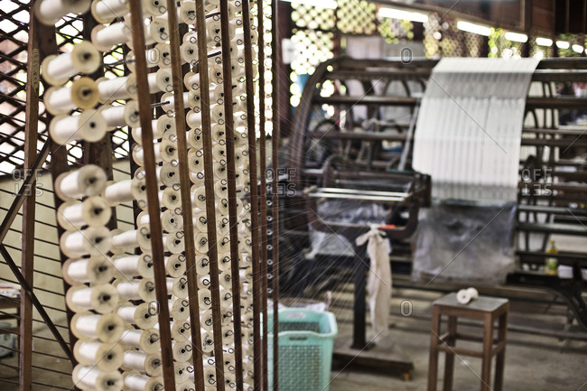 Spools of silk in a factory