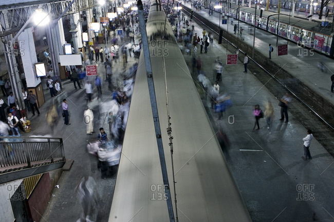 Mumbai, India - February 5, 2015: People at a busy train station