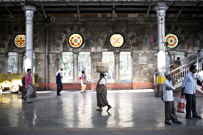 Mumbai, India - February 6, 2015: People at a train station