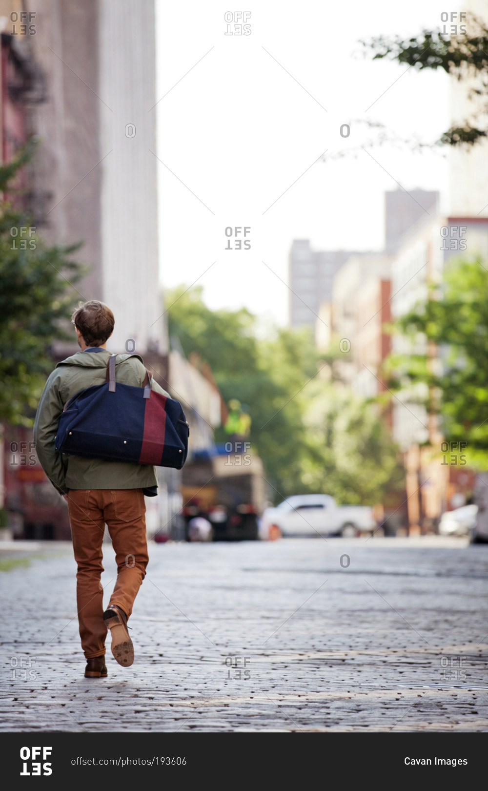 man carrying backpack