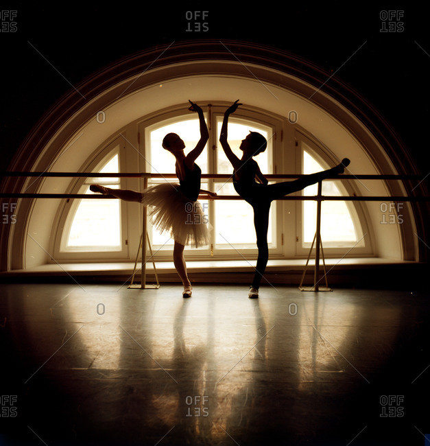 dancer in front of a window