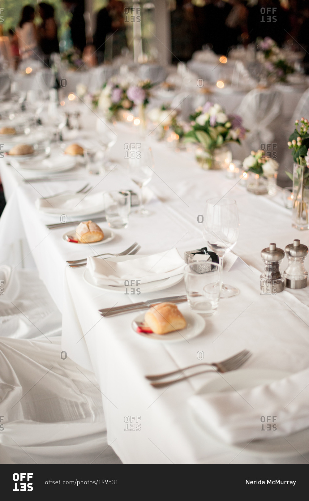 Long banquet table set for a wedding reception