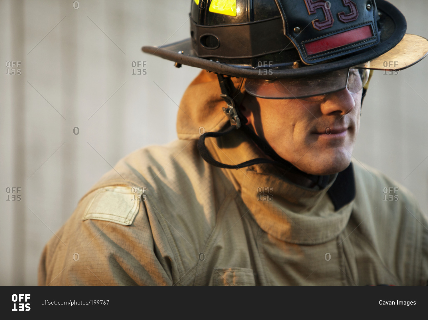 A fireman wearing his helmet