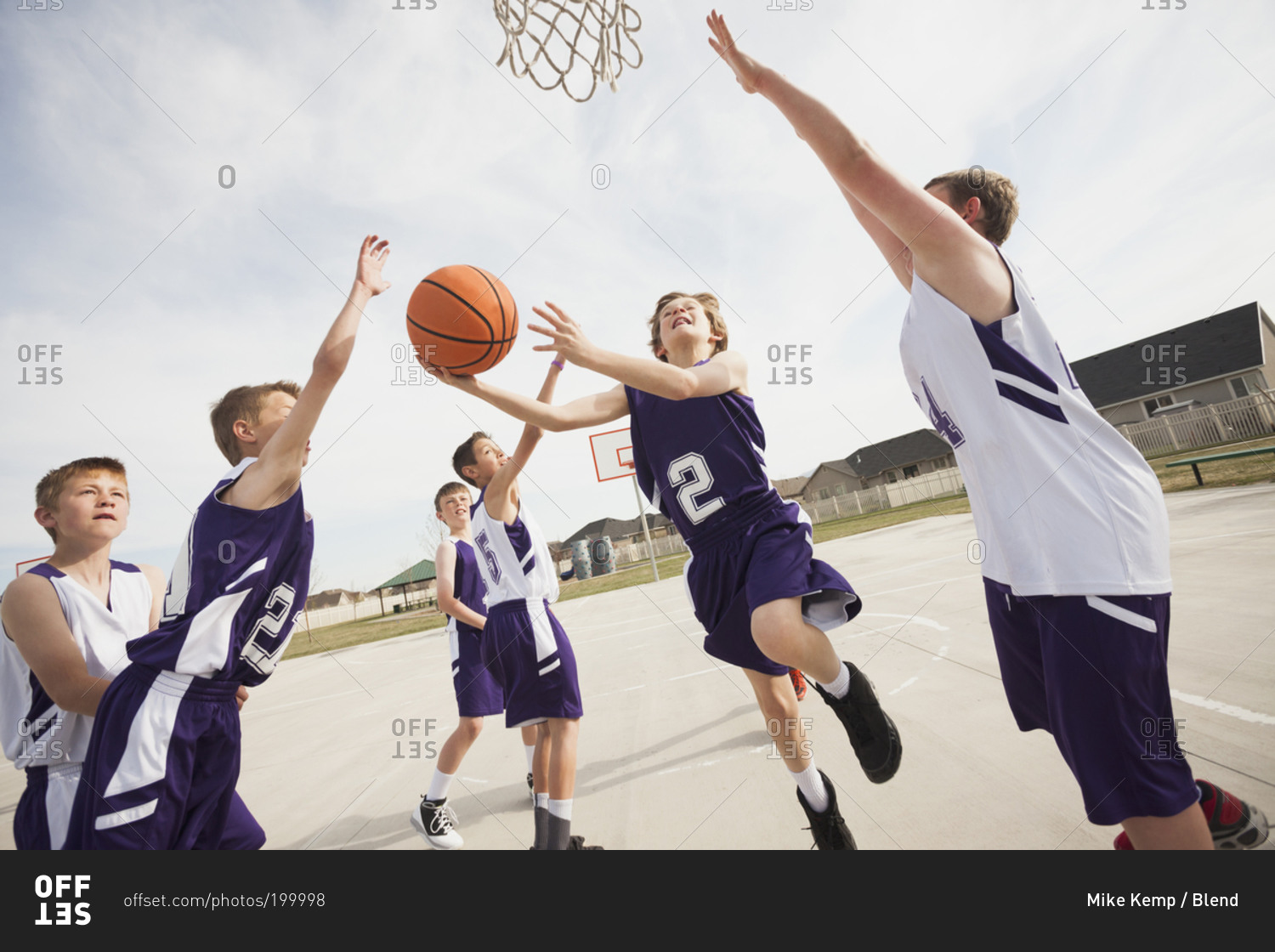 Group Of Children Playing Basketball Stock Photo   OFFSET