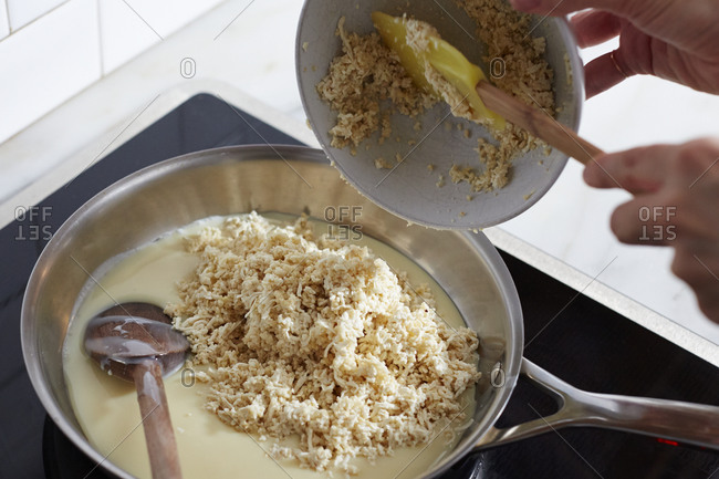 Mixing shredded tofu into condensed milk