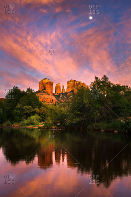 The moon rising above Cathedral Rock at Red Rock Crossing in Sedona, Arizona, USA