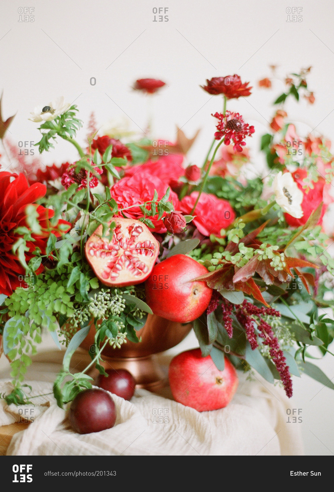 Close up of pomegranate floral arrangement