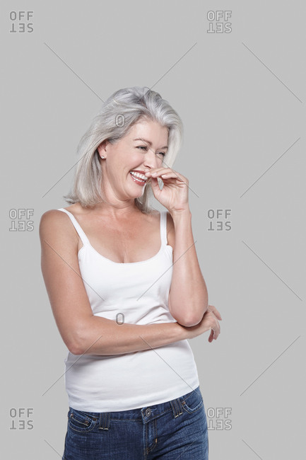 Studio portrait of a woman with grey hair