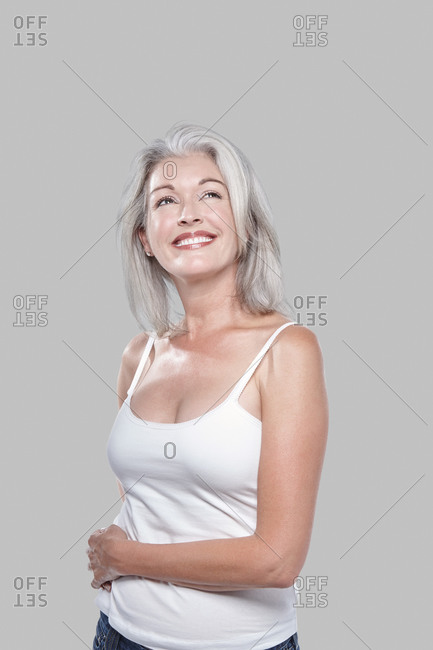 Studio portrait of a woman with grey hair