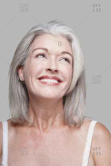 Studio portrait of a woman with grey hair