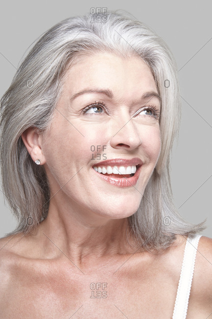 Studio portrait of a woman with grey hair