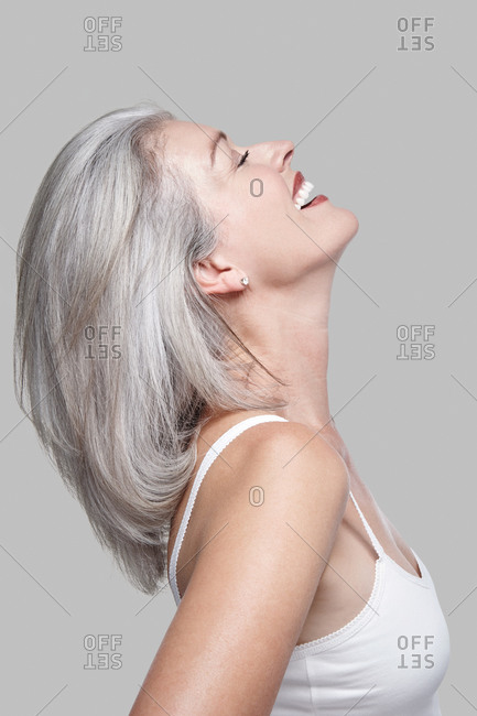 Studio portrait of a woman with grey hair
