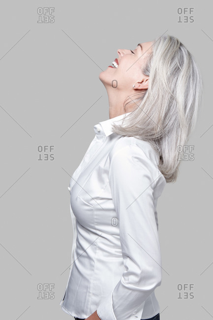 Studio portrait of a woman with grey hair