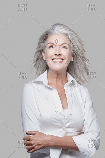 Studio portrait of a woman with grey hair