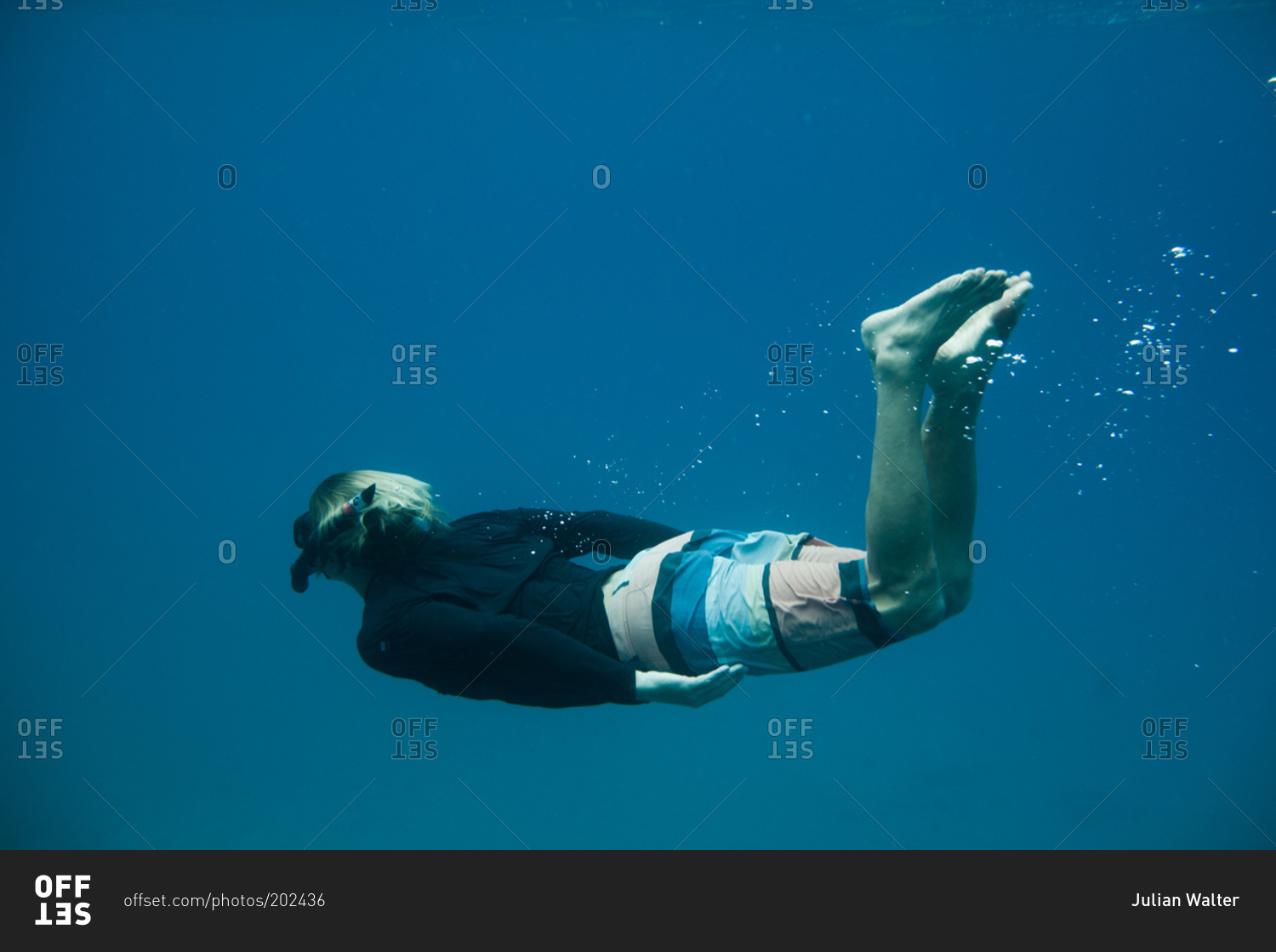 Man snorkeling in the Pacific Ocean
