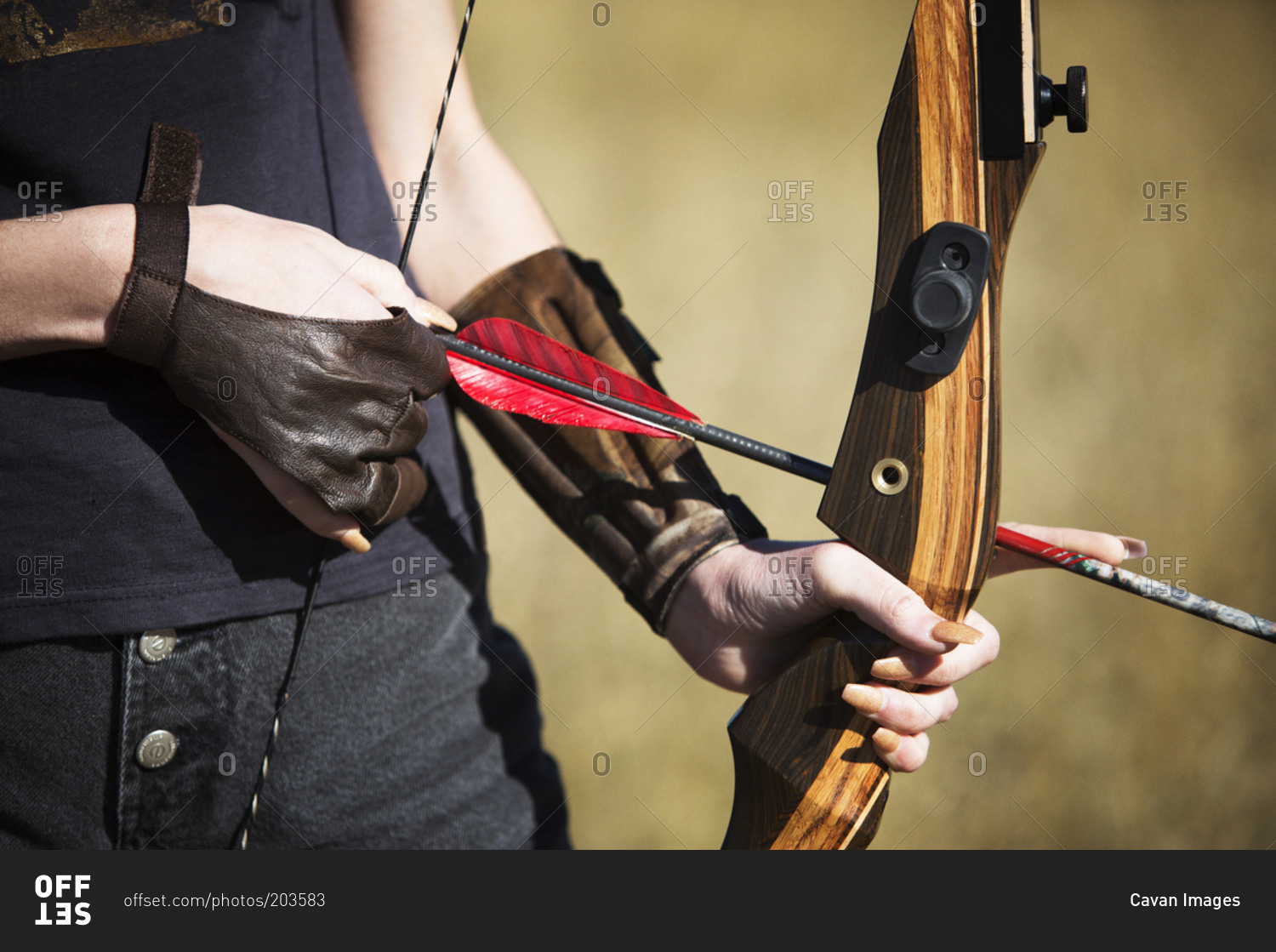 Holding Bow And Arrow Pose