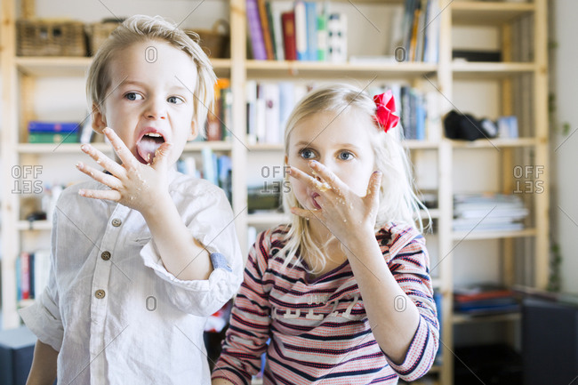 children-licking-their-fingers-stock-photo-offset