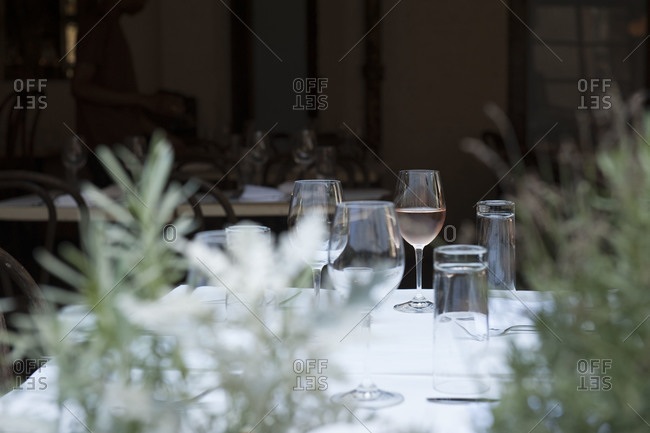 Glass of wine sitting on a restaurant table