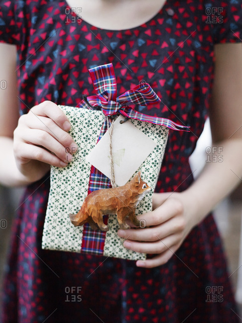 Girl holding a present