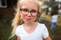 Portrait of little girl wearing glasses stock photo