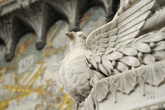 Bird carving on a column in the Basilica Notre-Dame de Fourviere in Lyon, France