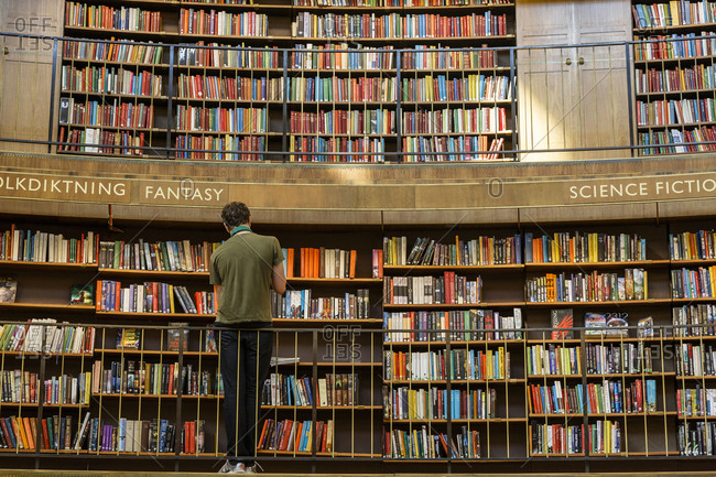 Stockholm, Sweden - July 28, 2014: Man at the Stadsbiblioteket, Stockholm, Sweden
