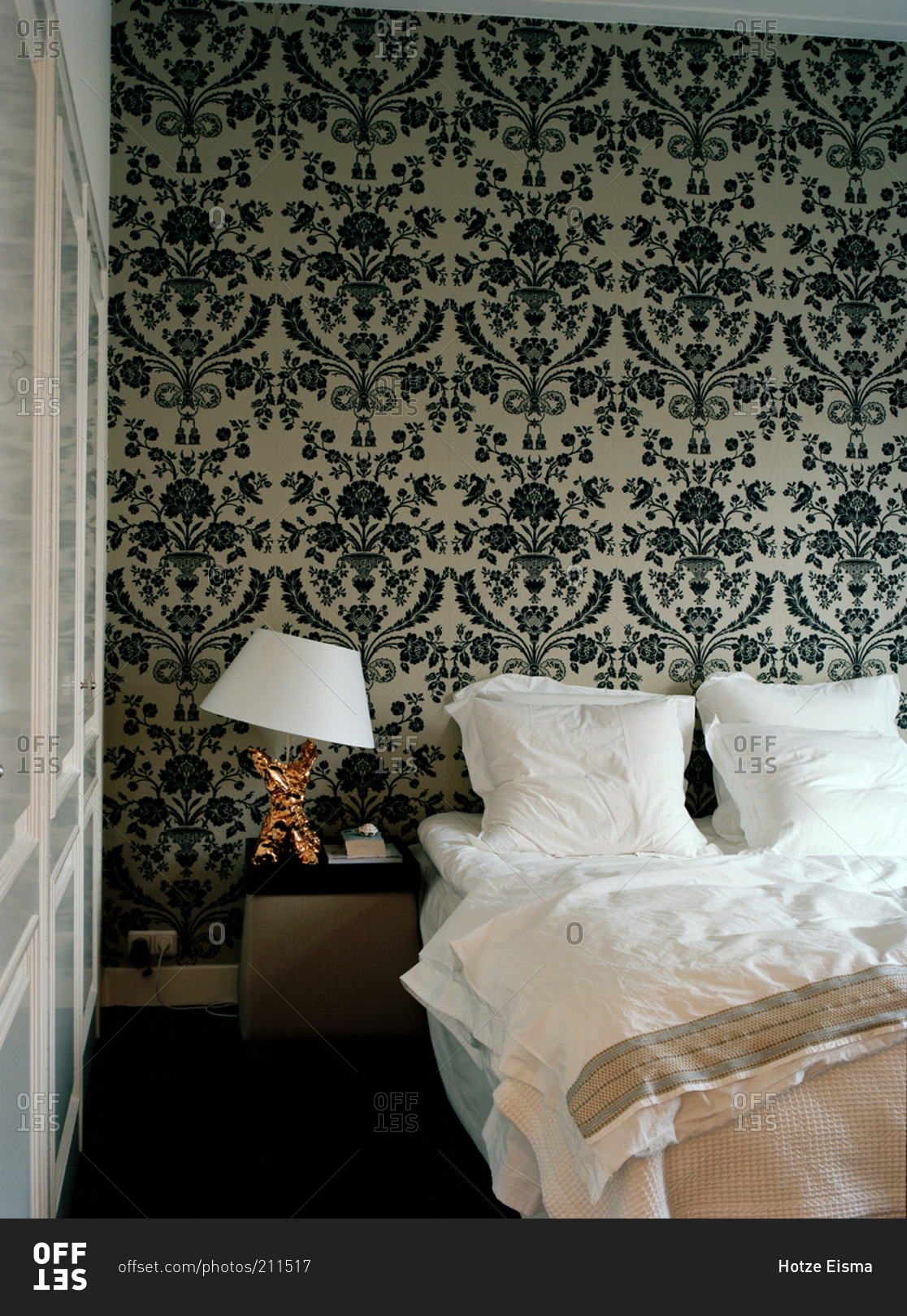 Bedroom interior with seamless wallpaper