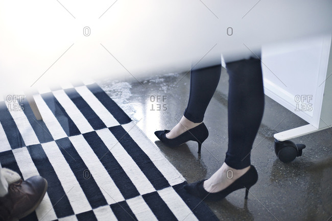 Woman wearing high heels in an office
