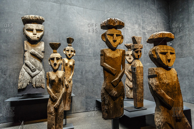 Santiago, Chile - September 23, 2014: Exhibition of the Mapuche burial  statues in the Museum of Arte Precolombino stock photo - OFFSET