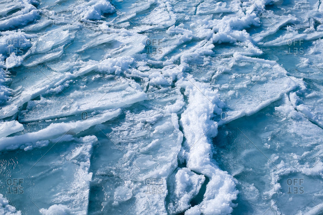 Surface of a choppy frozen lake