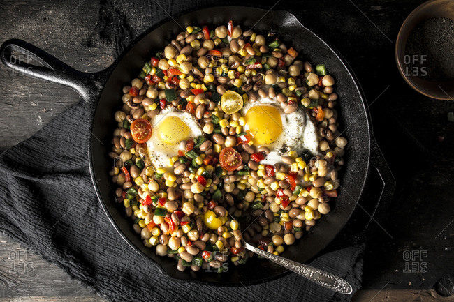 Texas caviar in a cast iron skillet served on a table
