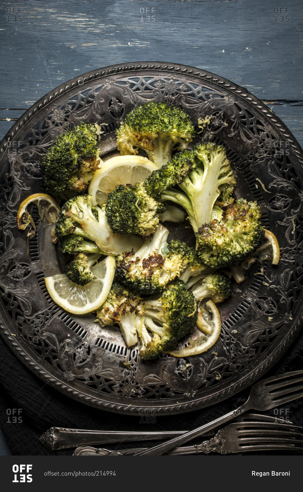 Roasted broccoli served on an antique plate