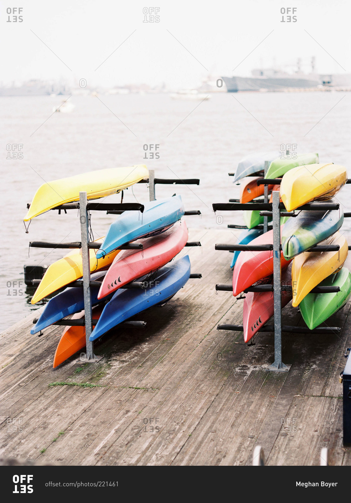 Canoes on rack in harbor