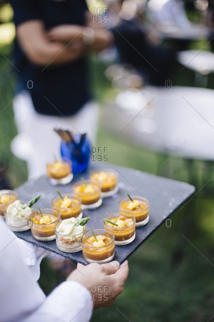 Waiter Serving Appetizers On A Wedding Reception Stock Photo Offset