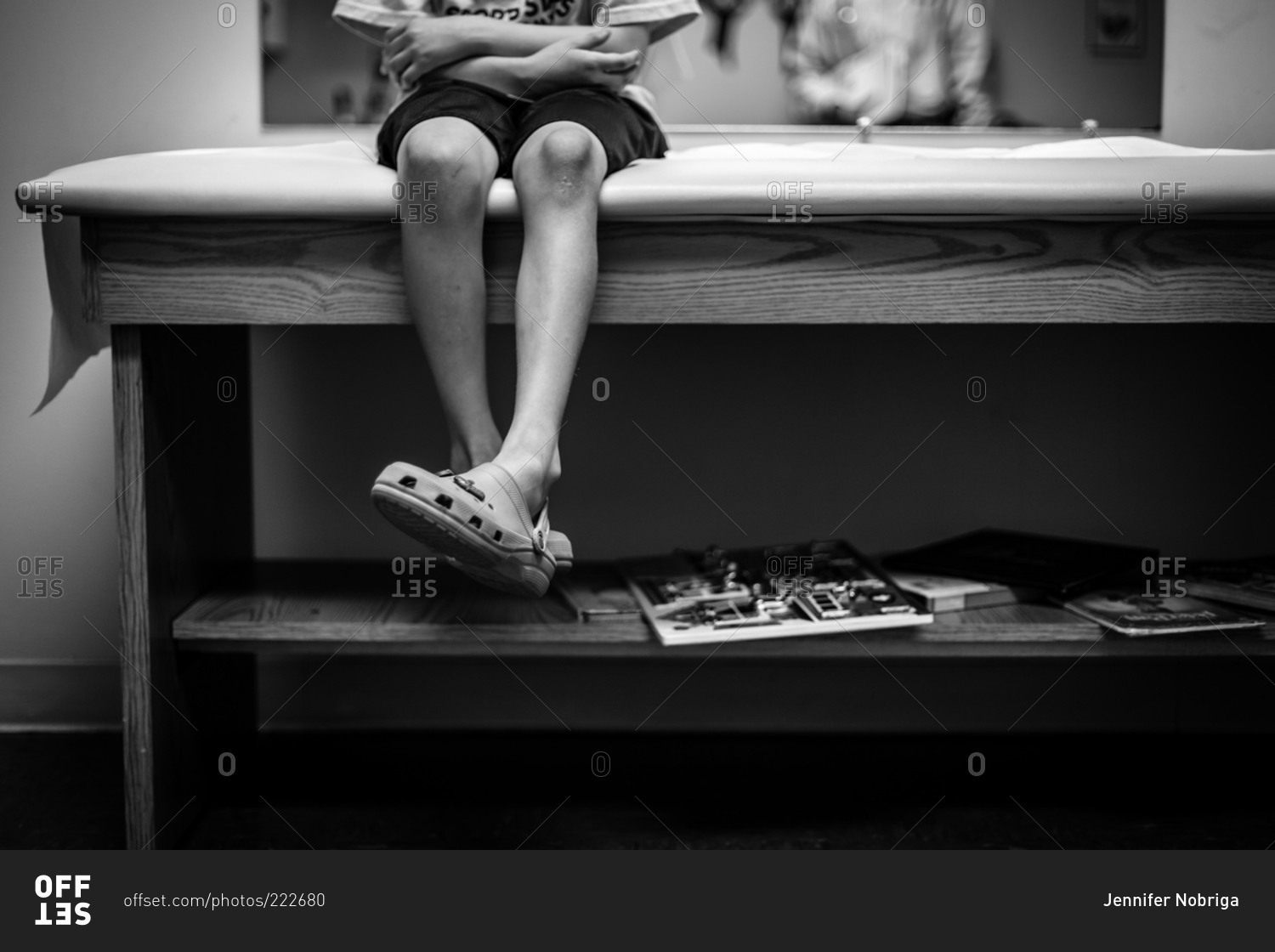 boy-waiting-in-a-doctor-s-office-stock-photo-offset