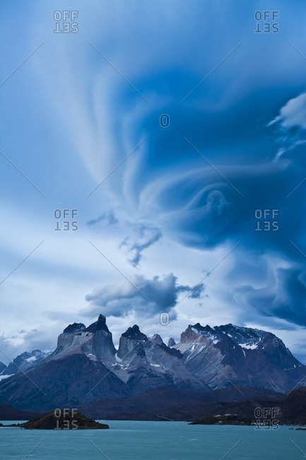 Lenticular clouds forming above the iconic Cuernos in Chile's Torres del Paine national Park