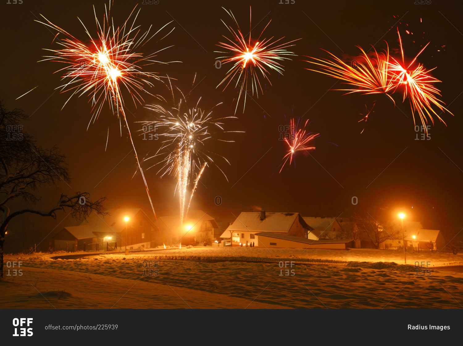 Celebrating new year's eve with fireworks in village
