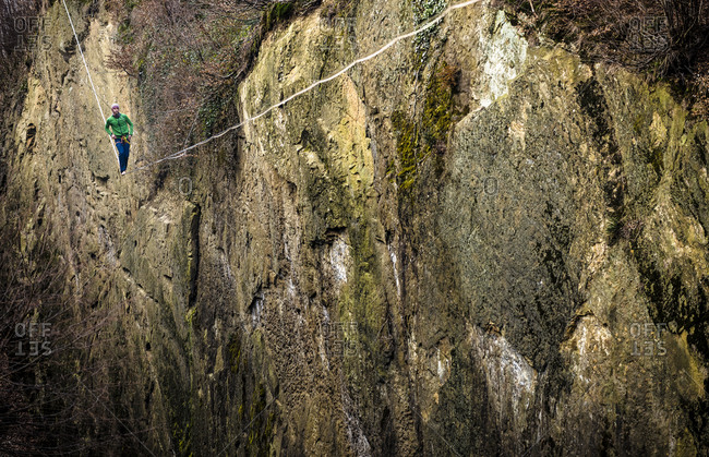 Man walks across a highline