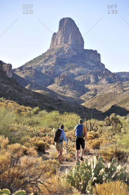 Backpackers hike on the popular Peralta Trail in the Superstition Wilderness Area, Tonto National Forest