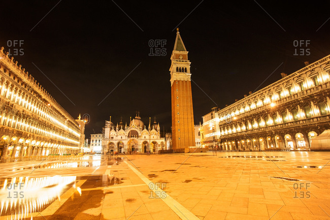 Saint Mark's Basilica and the Campanile at night in Venice, Italy