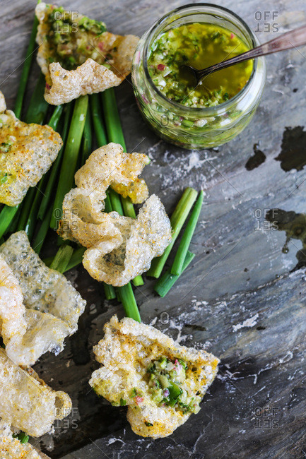 Grilled scallions and fried pork skin