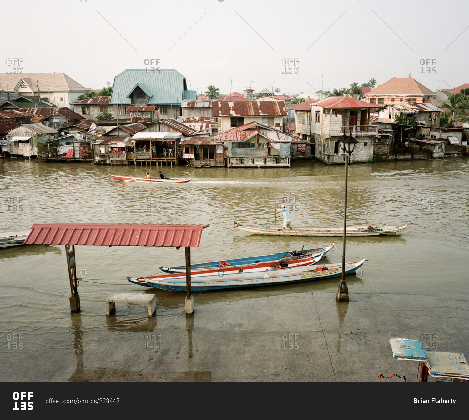 Boats On A River In Masantol, Philippines Stock Photo - Offset