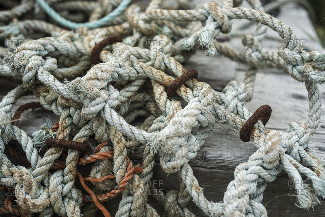 An old rope with rusted chains