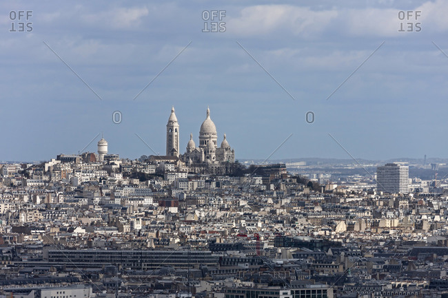 Crowded buildings with Montmartre in the distance, Paris