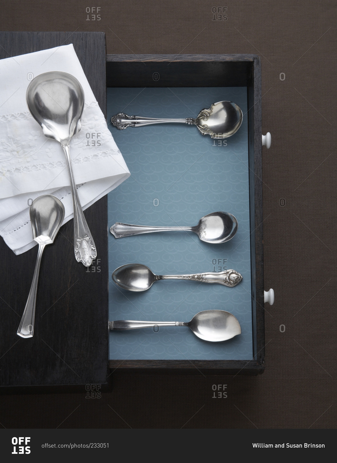 A variety of silver serving spoons