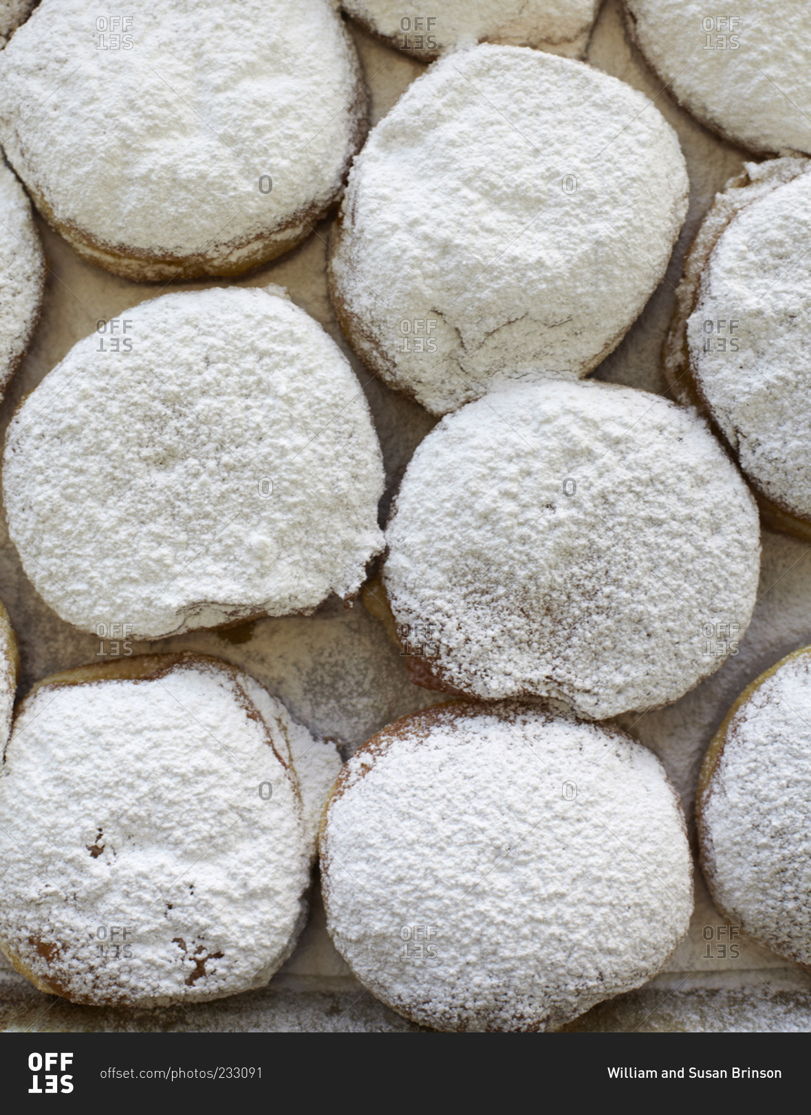 German pastries covered in powdered sugar stock photo - OFFSET