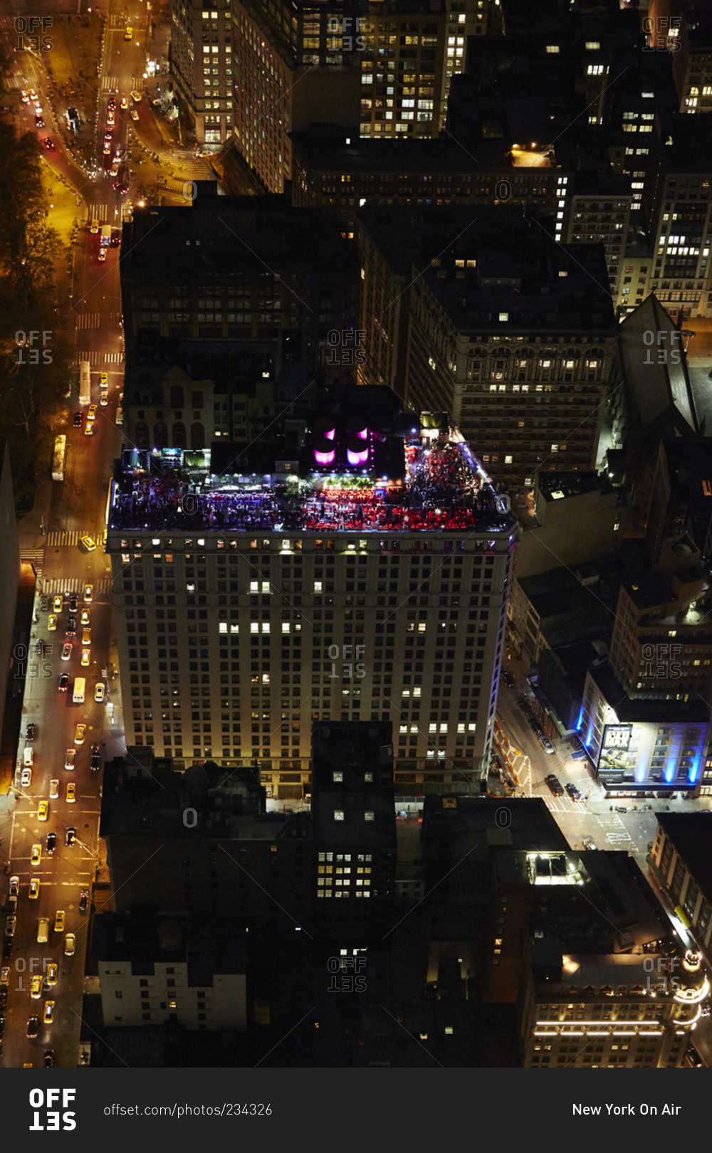 Brightly lit Manhattan rooftop